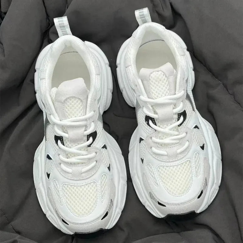 Beige women's mesh platform sports shoes with a wedge heel and lace-up front.