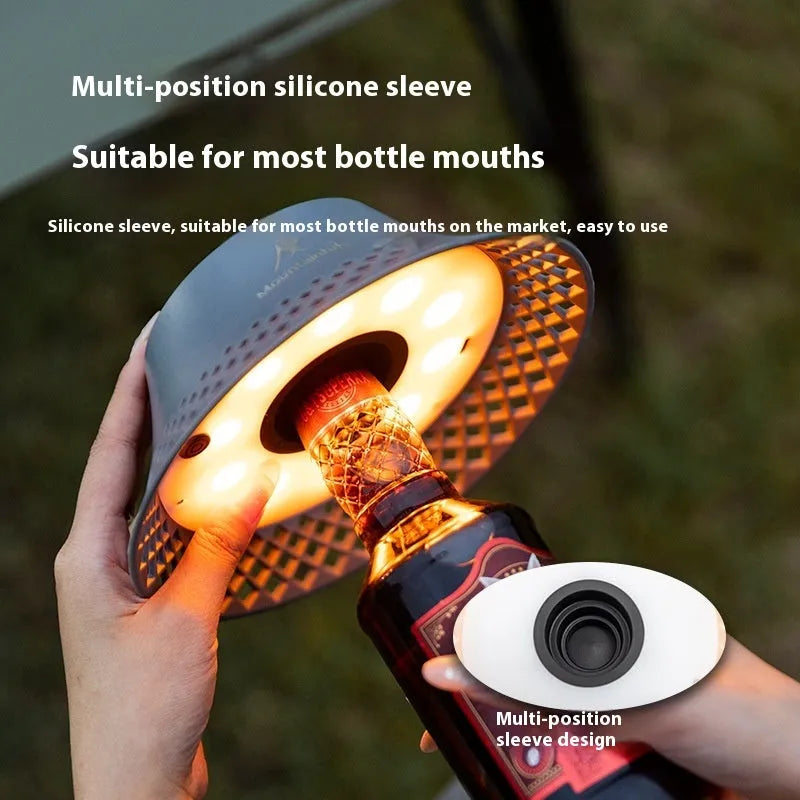 Wine bottle shaped camping lantern in beige colour with USB-C charging port