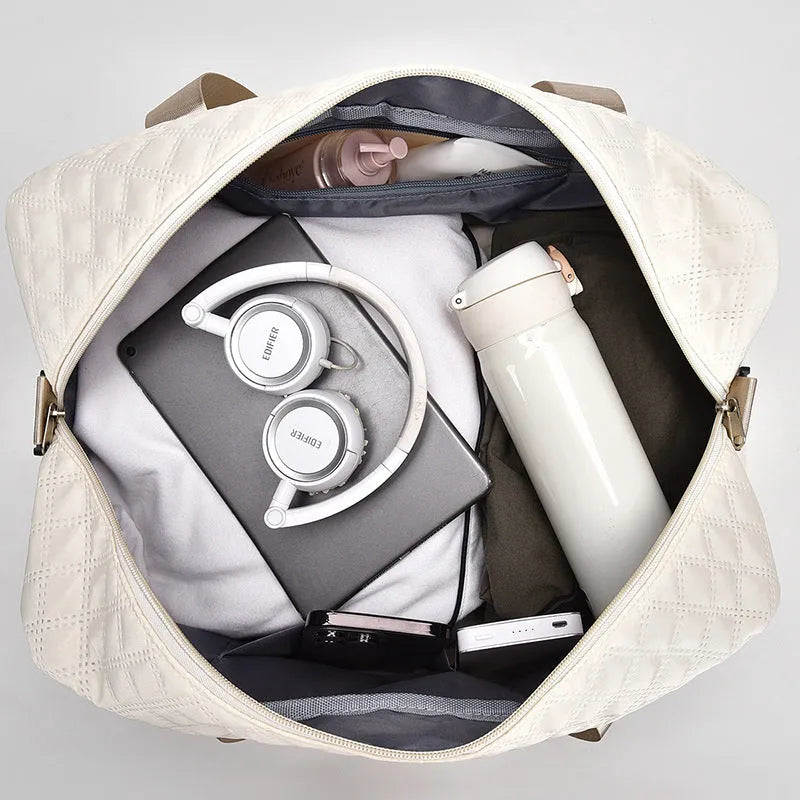 Large Oxford cloth travel bag in various colours with 36-55L capacity for buggy and leisure travel.
