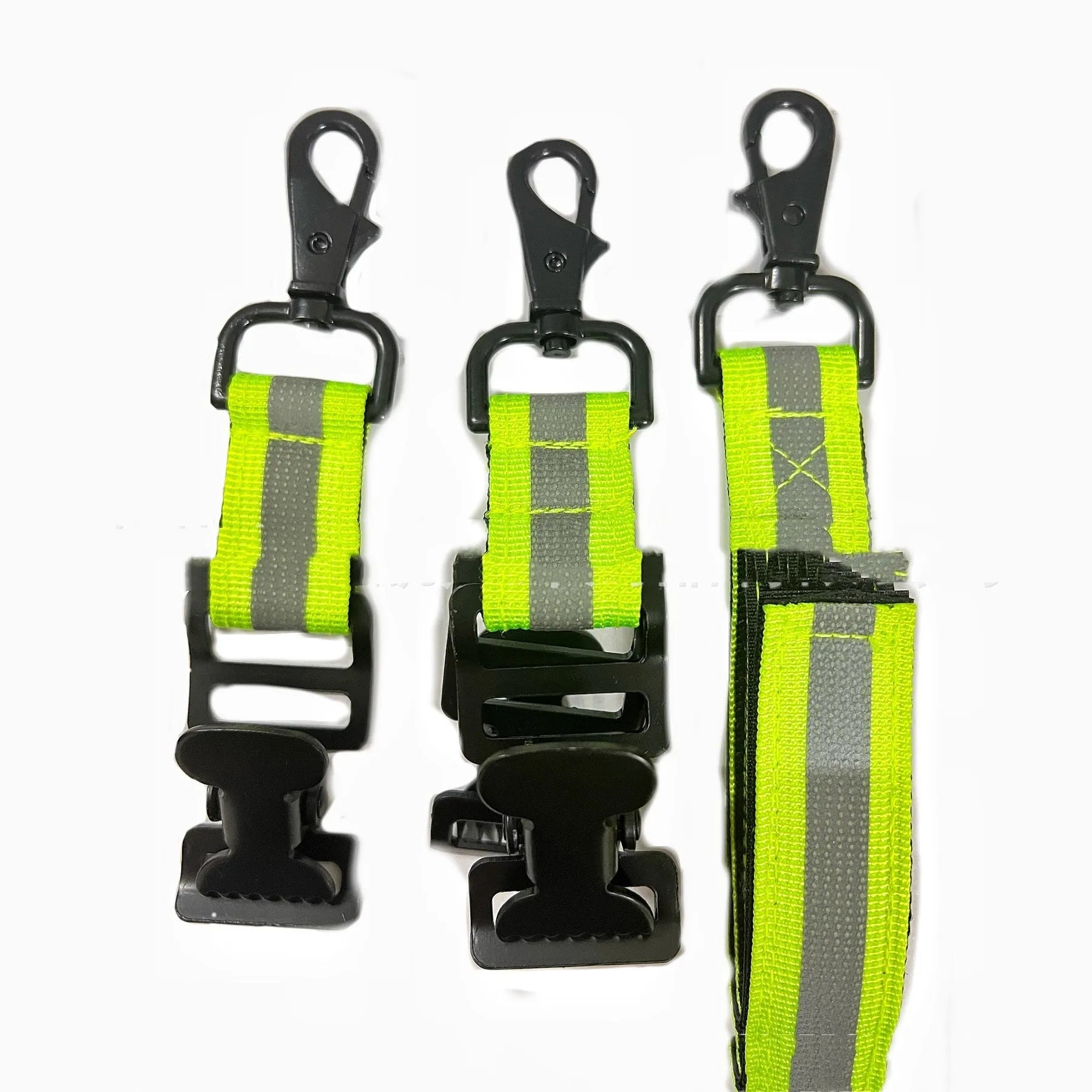 Fluorescent green reflective metal buckle clip for securing fireman gloves.