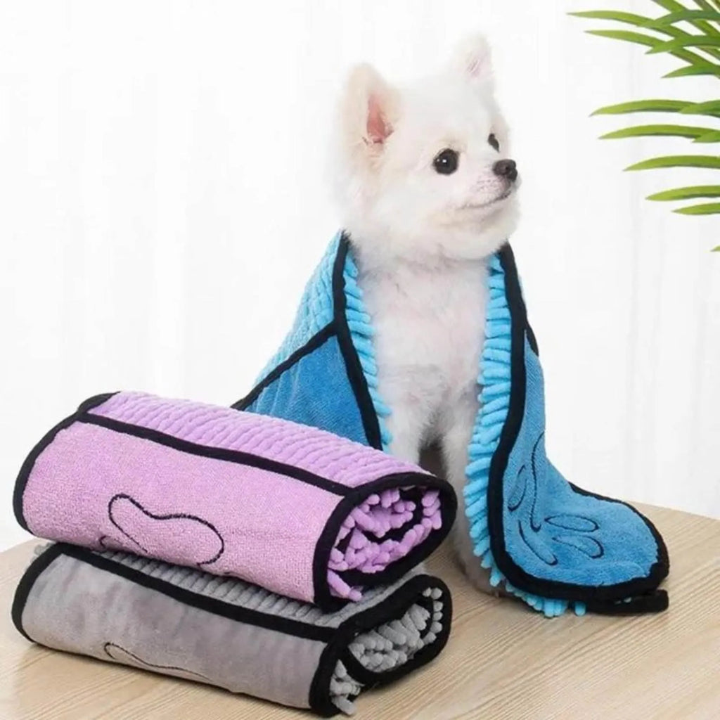 Soft fibre pet bath towel in blue, grey, purple, or red, measuring 62 cm by 23 cm.