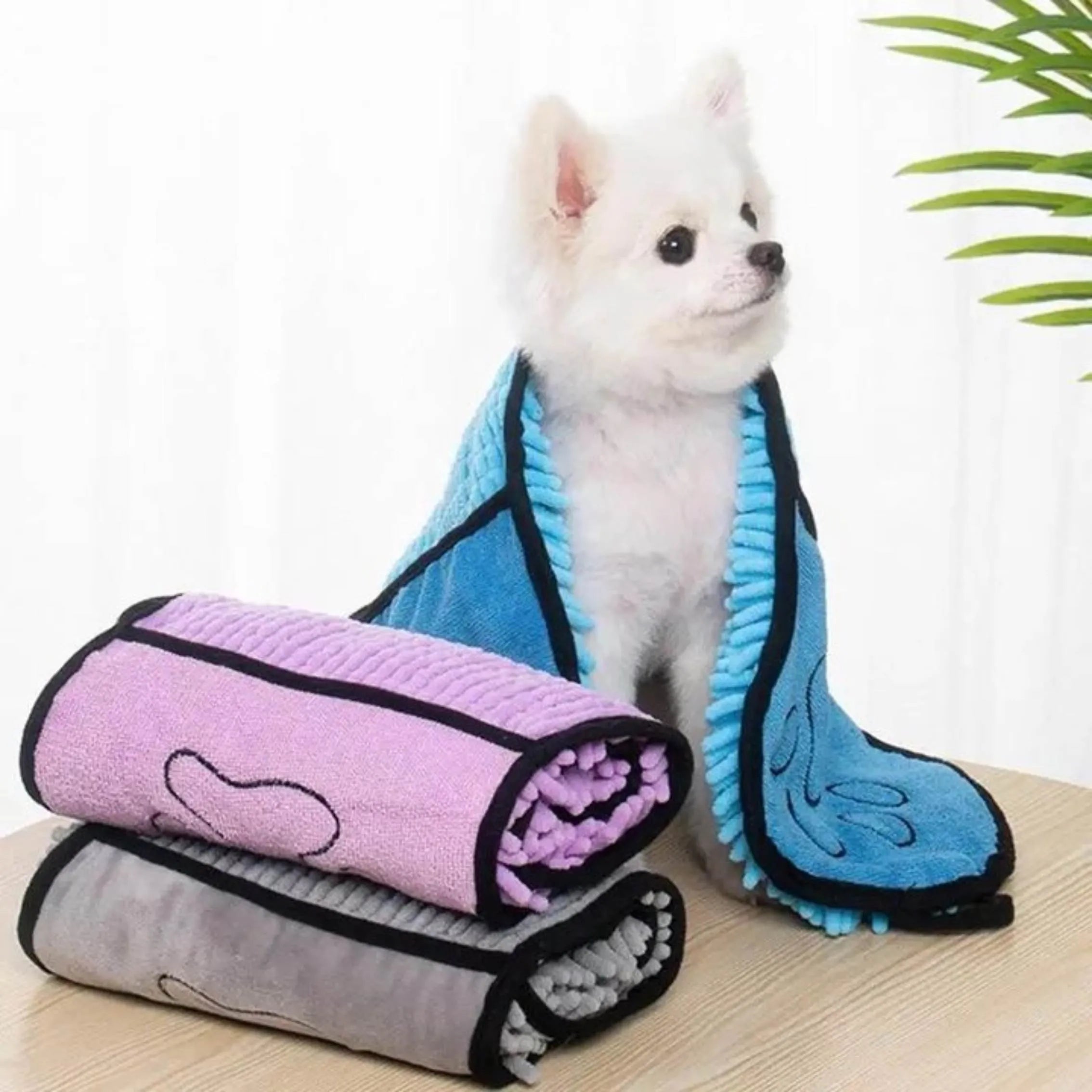 Soft fibre pet bath towel in blue, grey, purple, or red, measuring 62 cm by 23 cm.