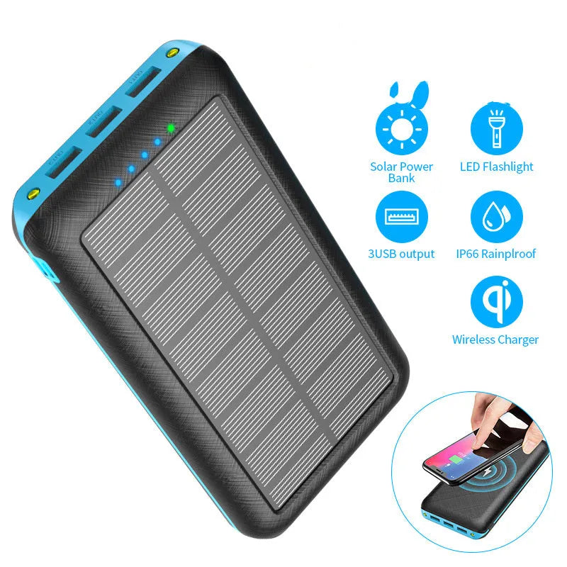 Black solar power bank with wireless Qi charging pad, three USB ports, and an LED flashlight
