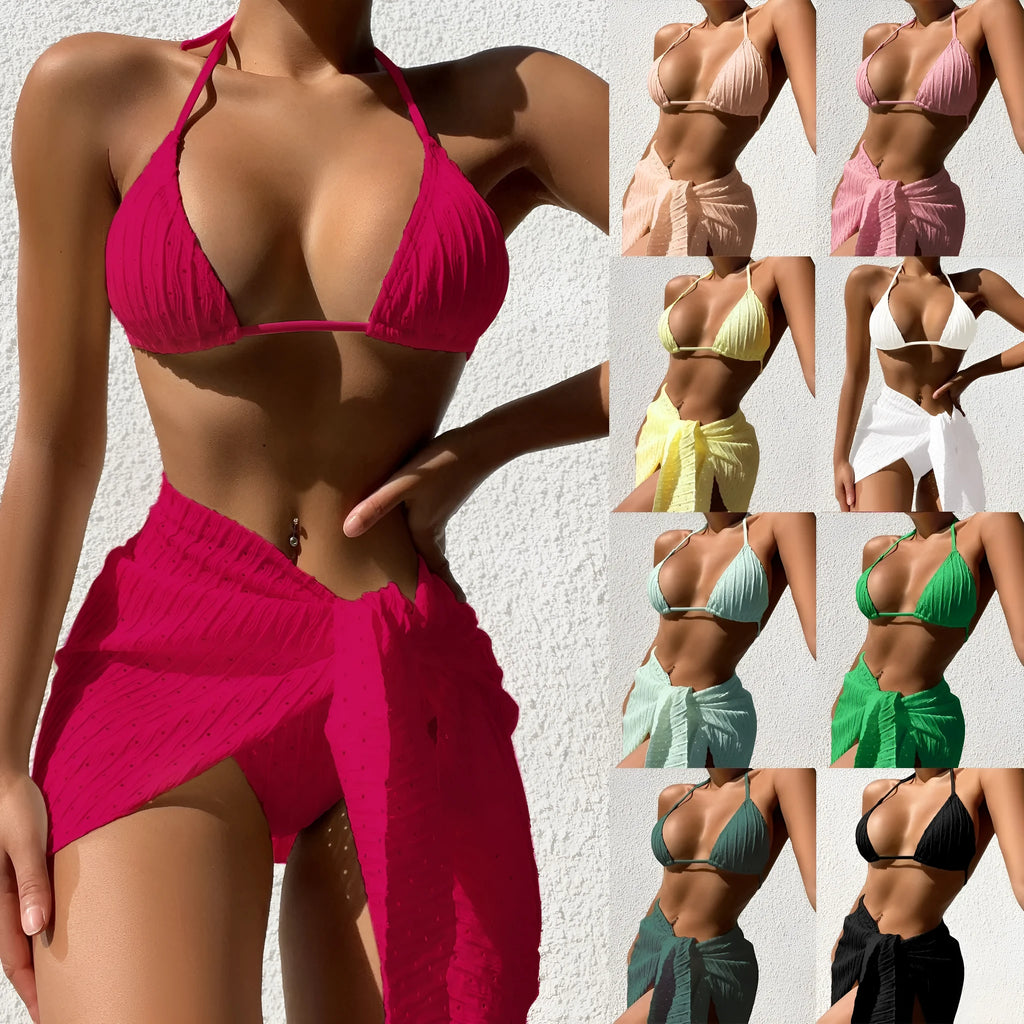 Women's halterneck backless bikini top with matching mesh skirt in a solid colour.