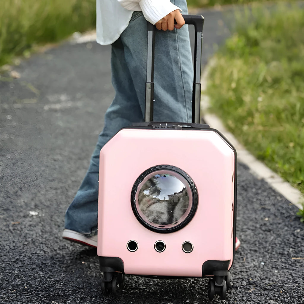 Hard shell PVC pet flight case trolley carrier in pink colour with luggage compartment