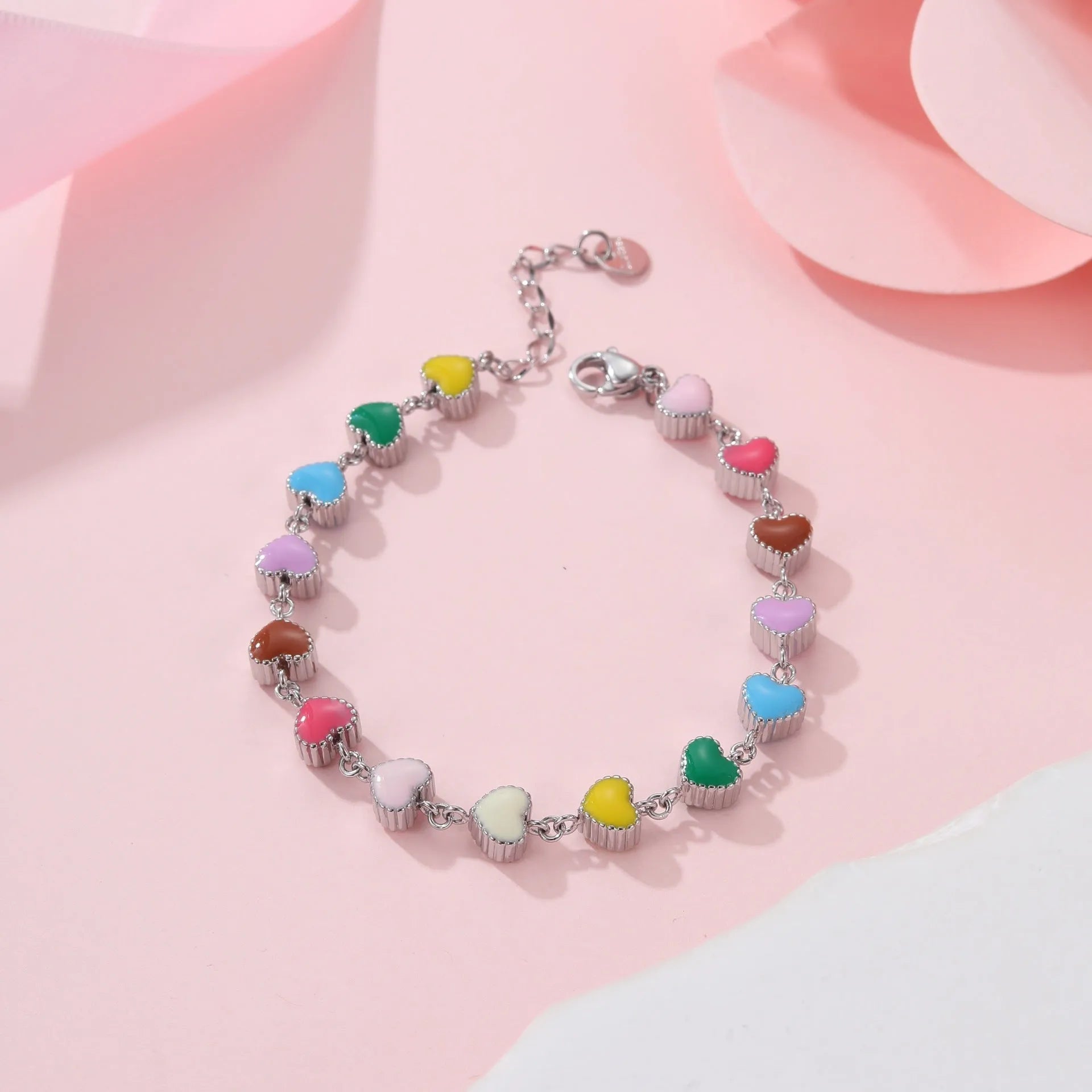 Women's stainless steel bracelet with love heart pendant in gold or steel finish