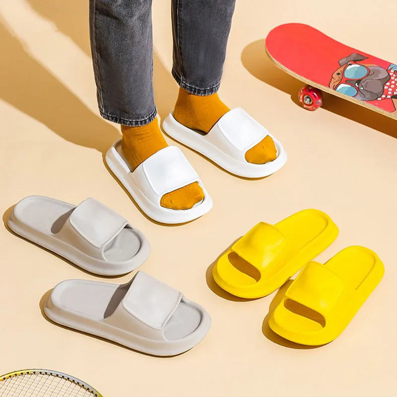 A pair of thick-soled, soft EVA flip-flop slippers with a non-slip tread pattern.