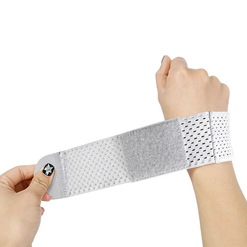 A black elastic breathable wrist guard for athletic wrist support.