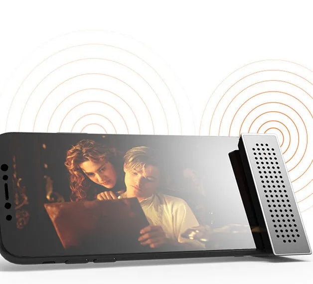 Portable iPhone speaker amplifier stand in ABS plastic showing phone in horizontal position