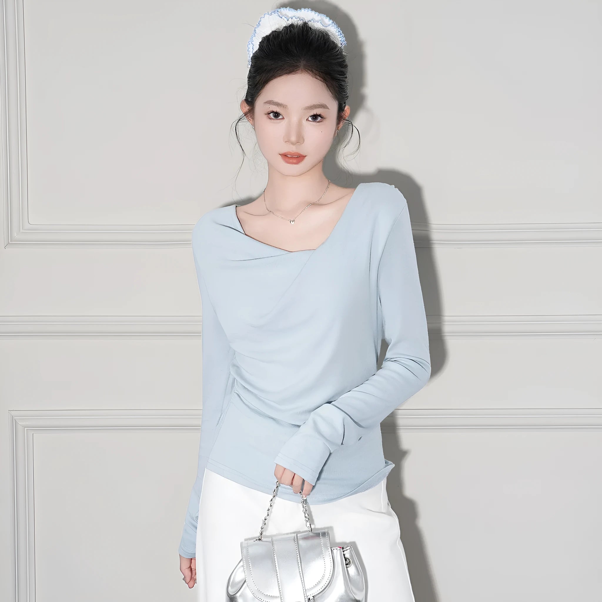 Off-shoulder cashmere long-sleeve top in light pink with pleated detail and slim fit