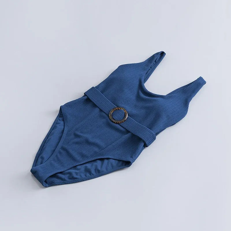 Navy blue women's one-piece slimming swimsuit with triangle design and chest pad