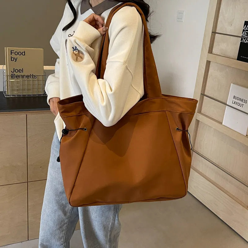 Foldable soft Oxford cloth commuter tote bag in street trend style, shown in multiple colour options