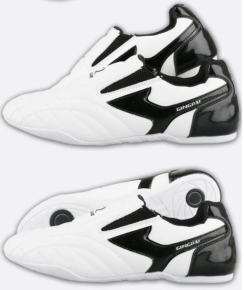Black and white children's martial arts shoes with soft sole and widened fit for boxing training