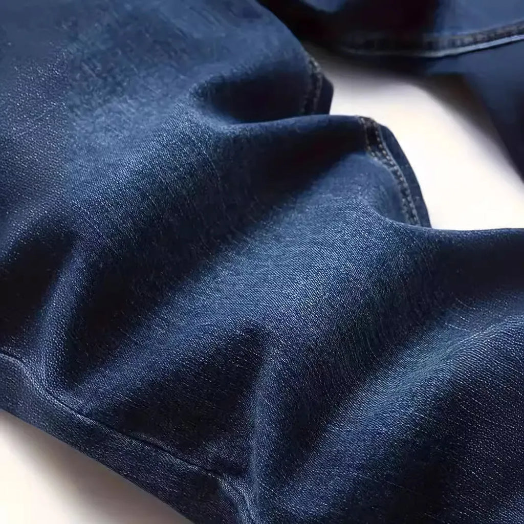 Men's dark blue skinny jeans with medium stretch cotton fabric and zipper fly