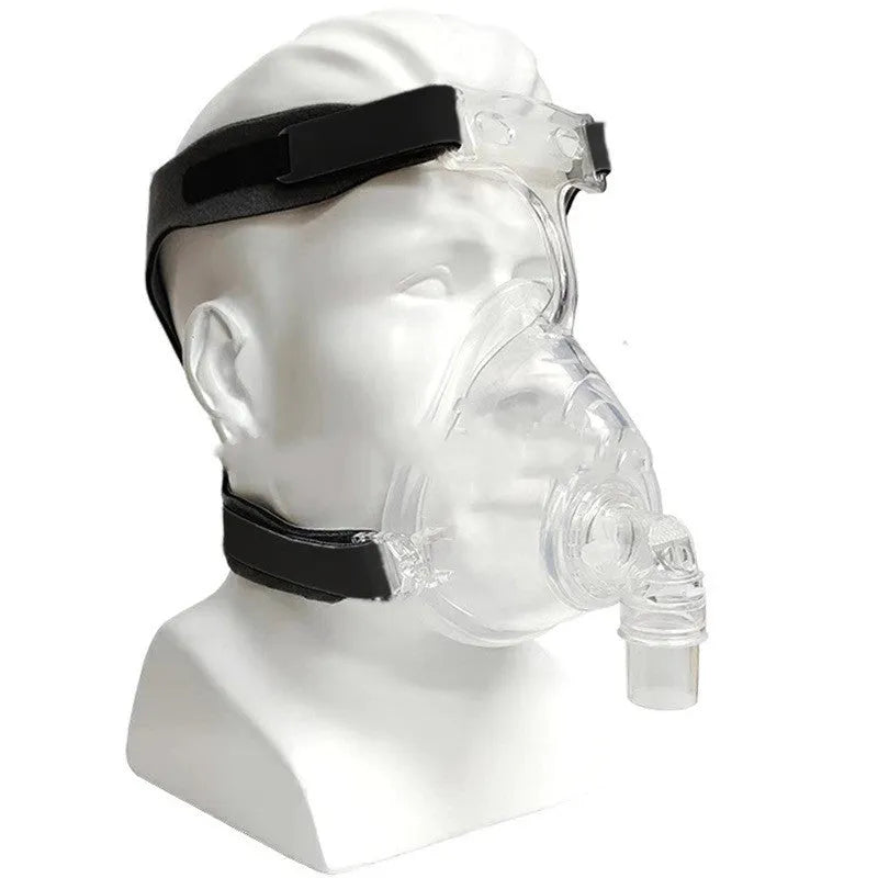 Transparent CPAP breathing mask with silicone seal, headgear, and two elbow connector options