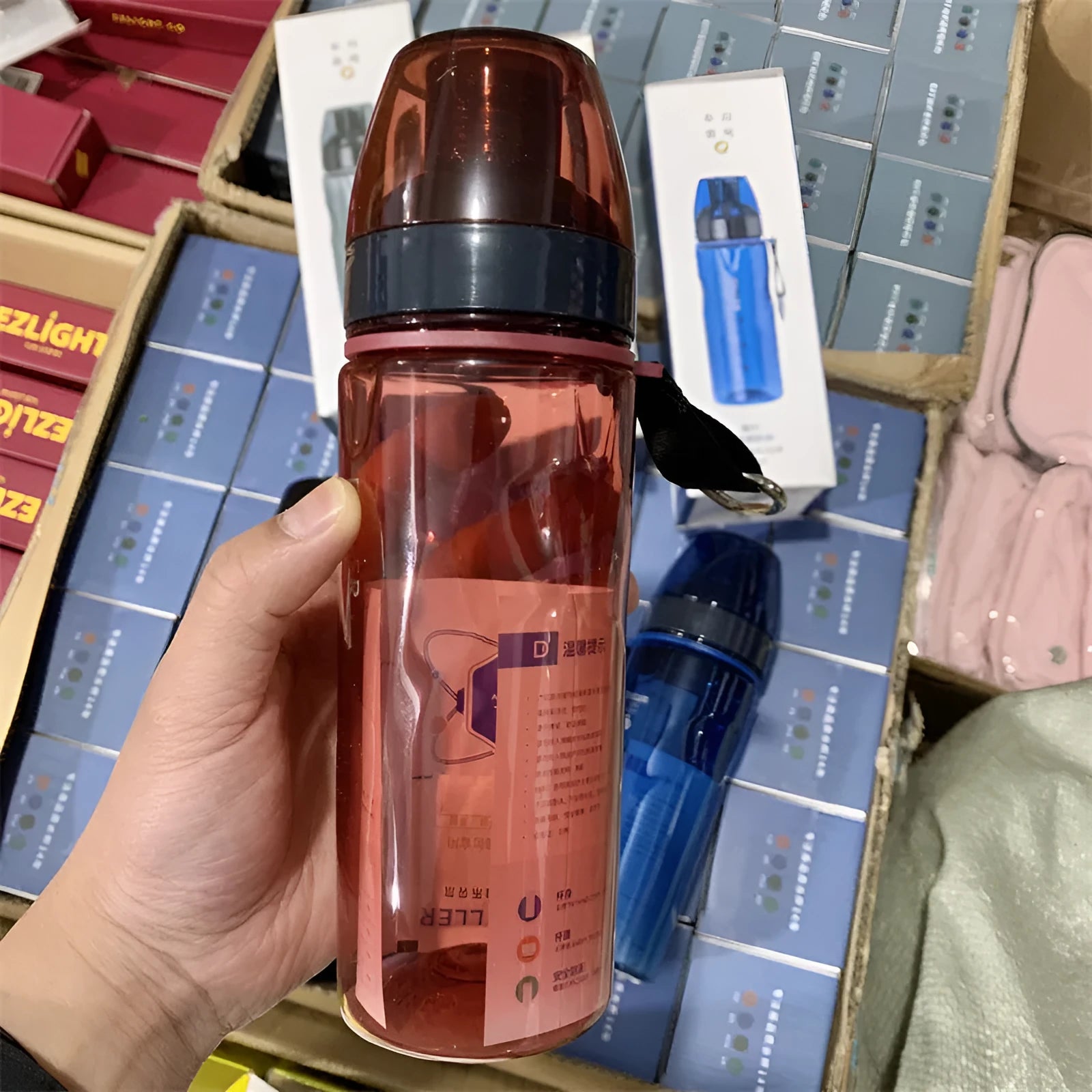 Chinese-style portable water cup with separate tea compartment in blue, red, black and grey colours