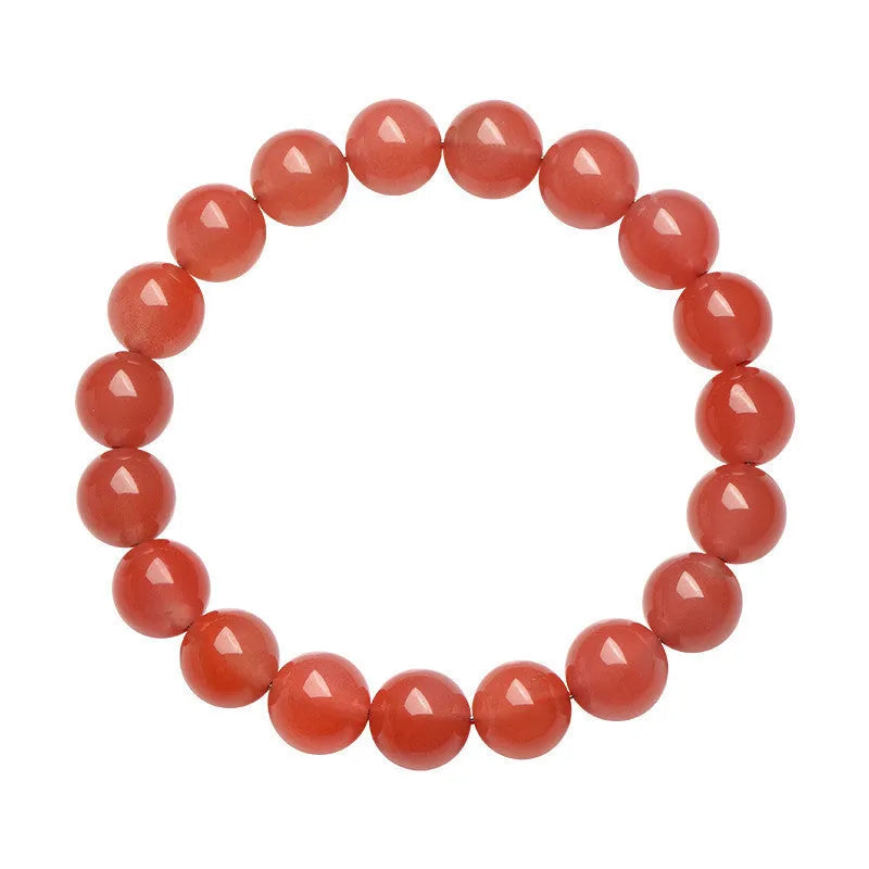 Natural cherry red agate scattered bead bracelet with polished stones on an adjustable strap.