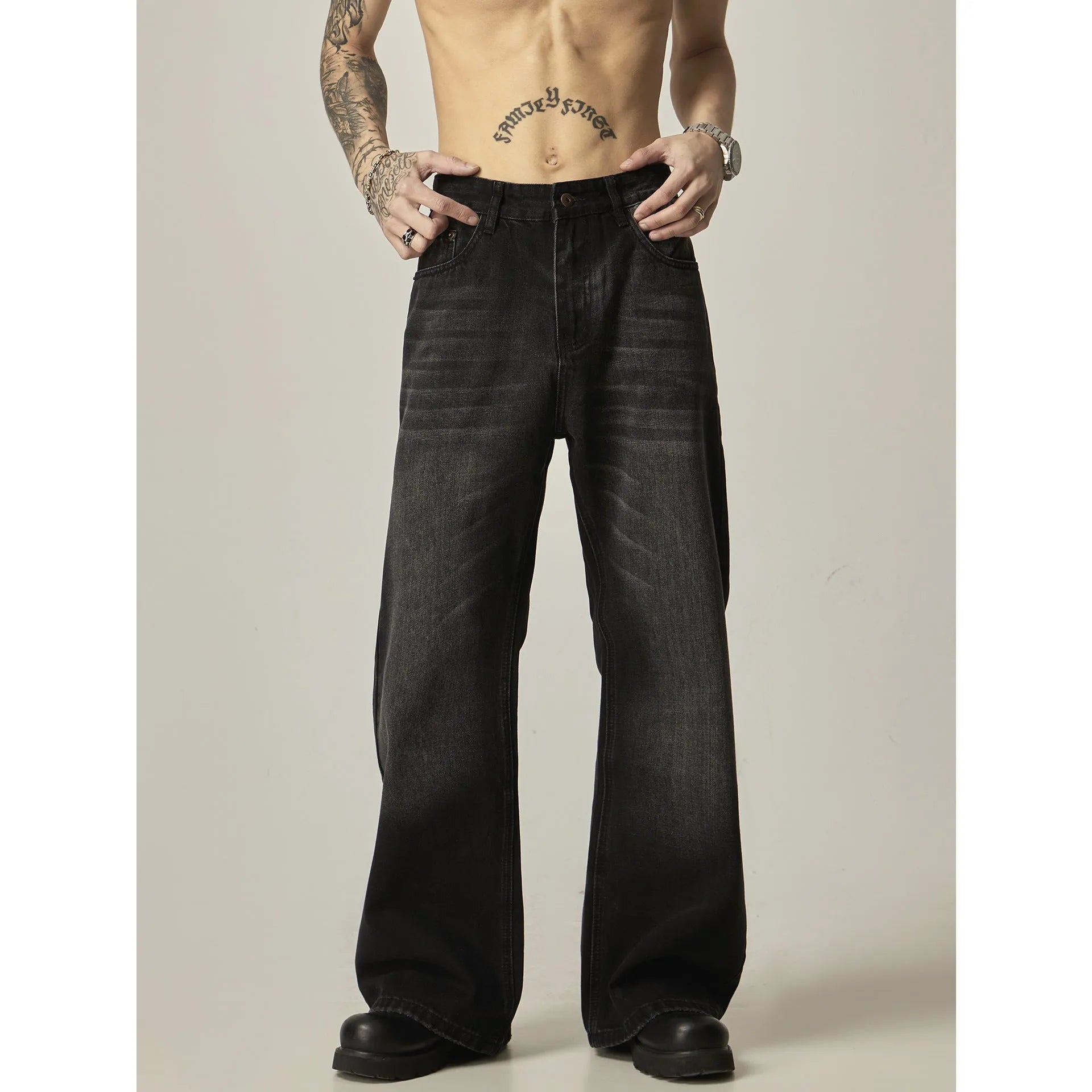 Black loose straight jeans with retro American styling and zipper fly opening