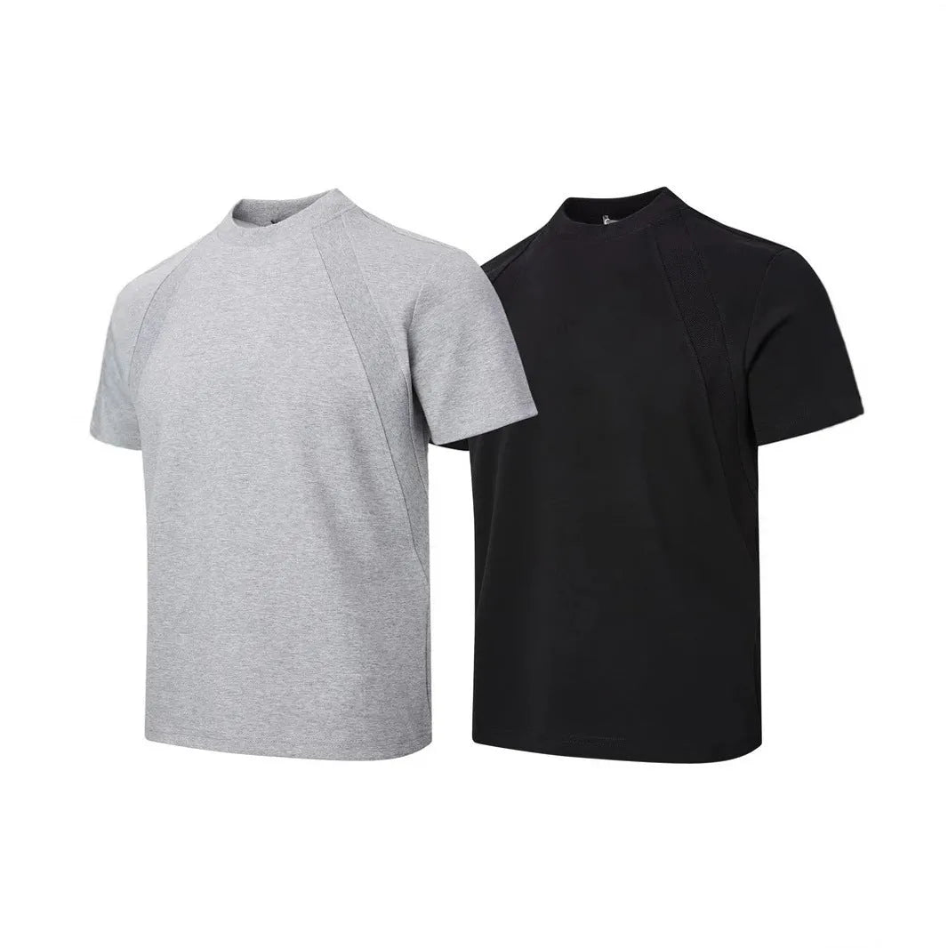 Loose-fit short sleeve top with textured air layer stitching in black.
