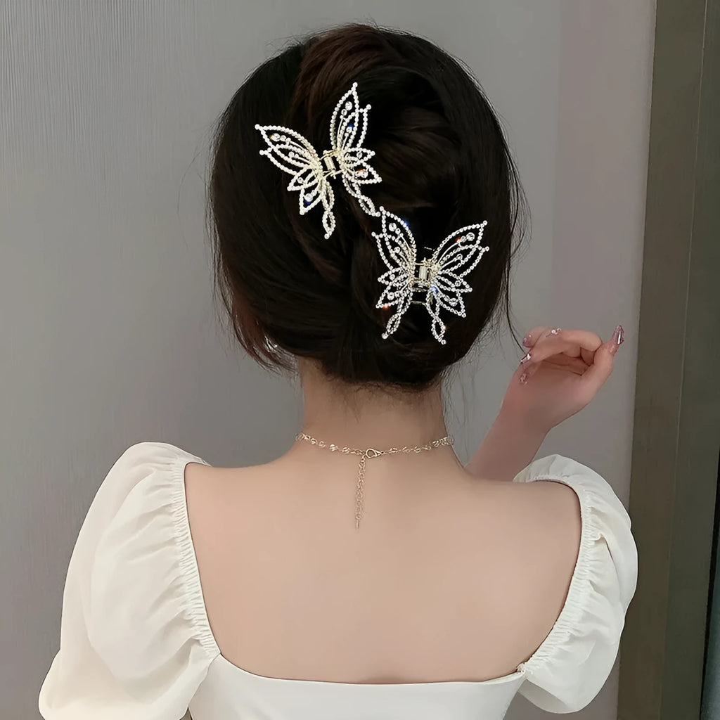 Butterfly-shaped hair barrettes for women with alloy construction and decorative rhinestone or pearl styling