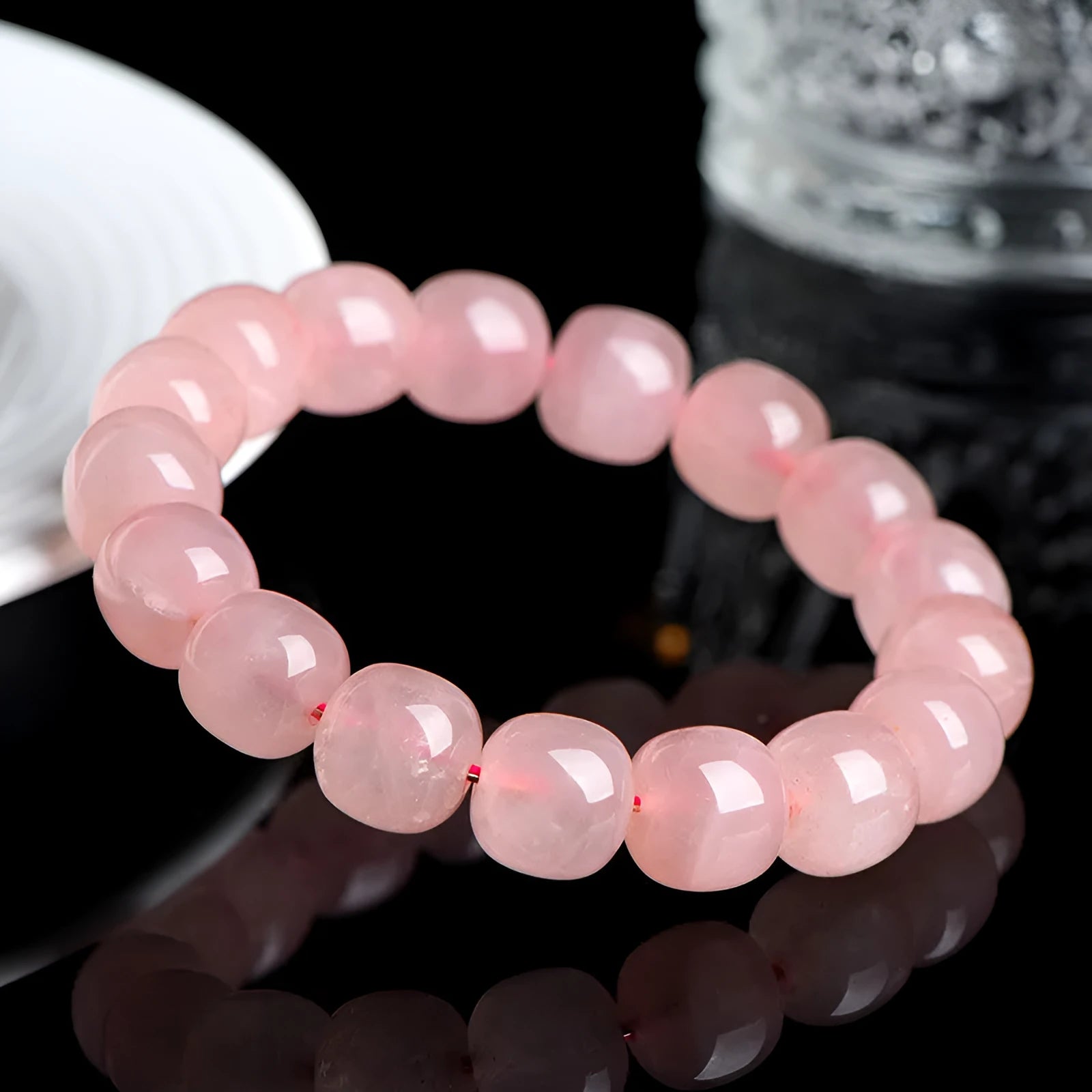Pink crystal barrel bead bracelet with geometric design and 8 x 10mm beads