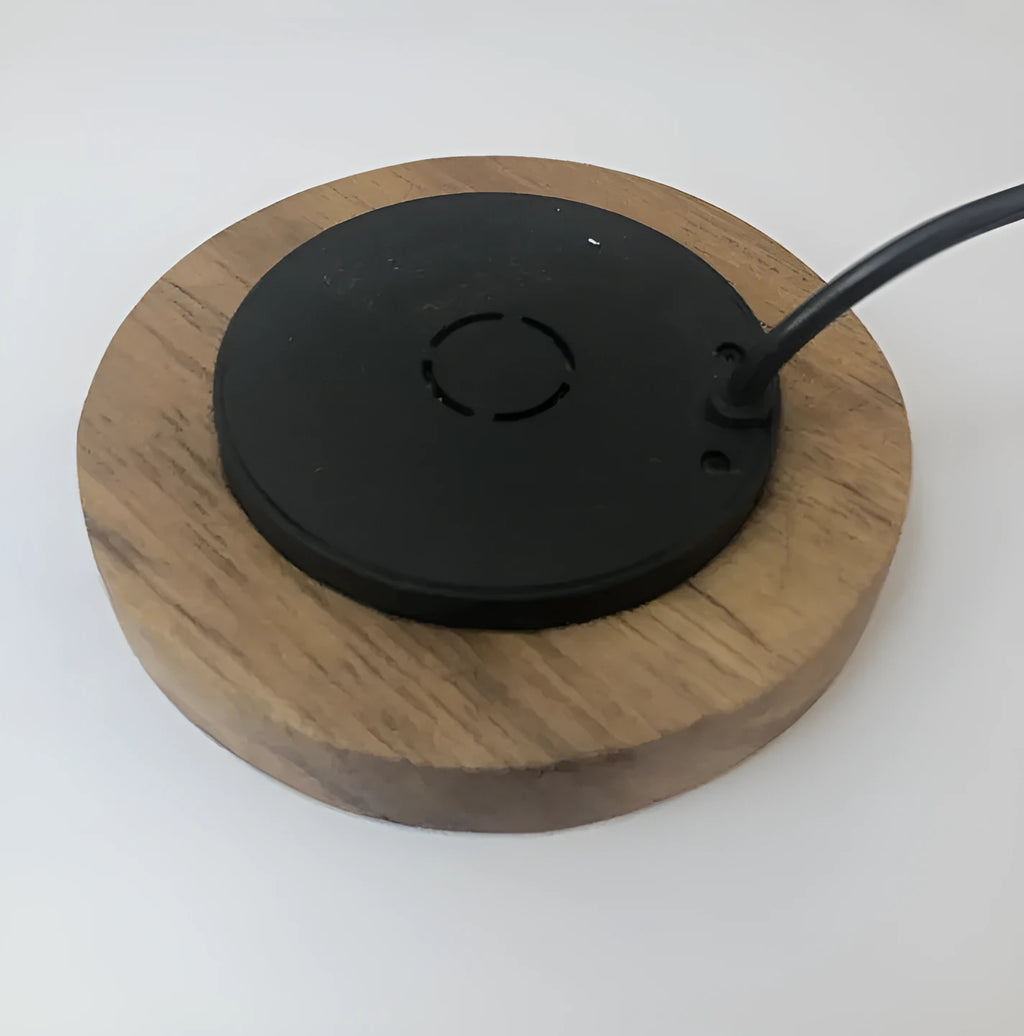 60mm round wireless charging pad for embedding into furniture surfaces with USB cable connection