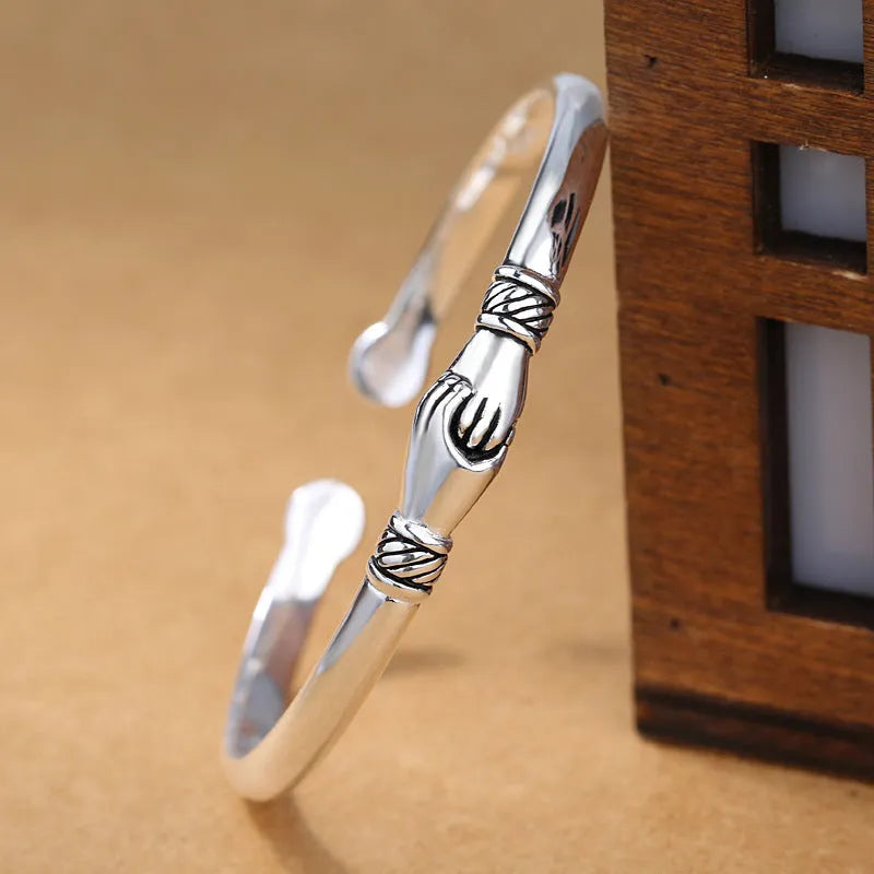 Retro copper handshake creative bracelet for women in silver metal finish