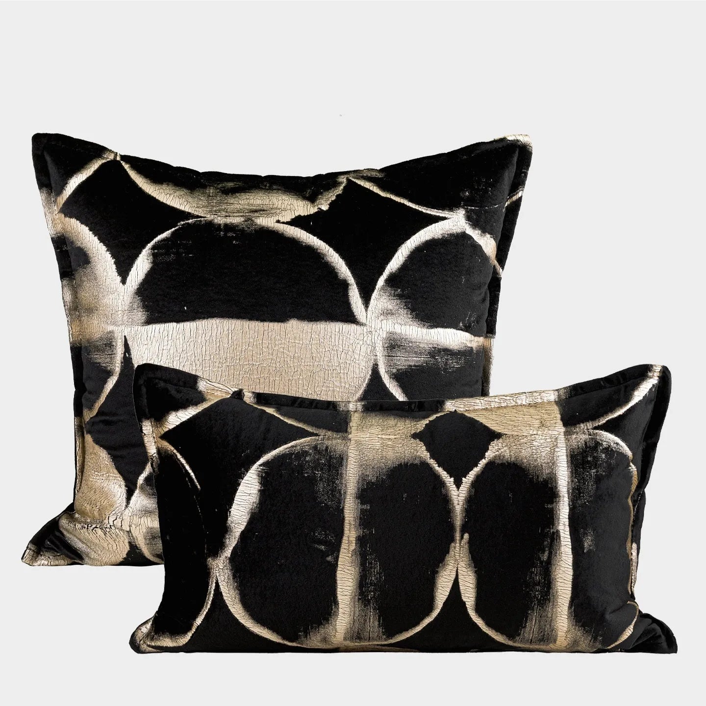 Abstract pattern black and gold flannel decorative cushion with removable cover.