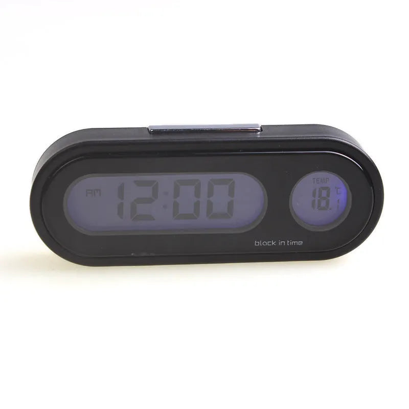 Black car clock thermometer with luminous LED display showing time and temperature on adjustable dashboard bracket