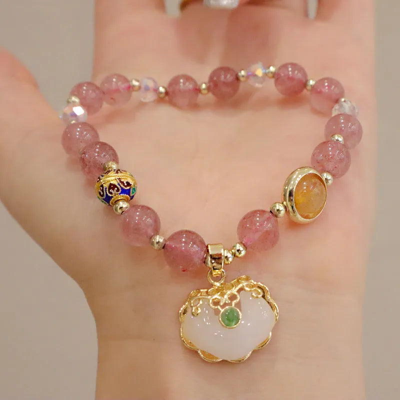 Geometric ethnic bracelet with natural jade, strawberry quartz stones and metal decorations