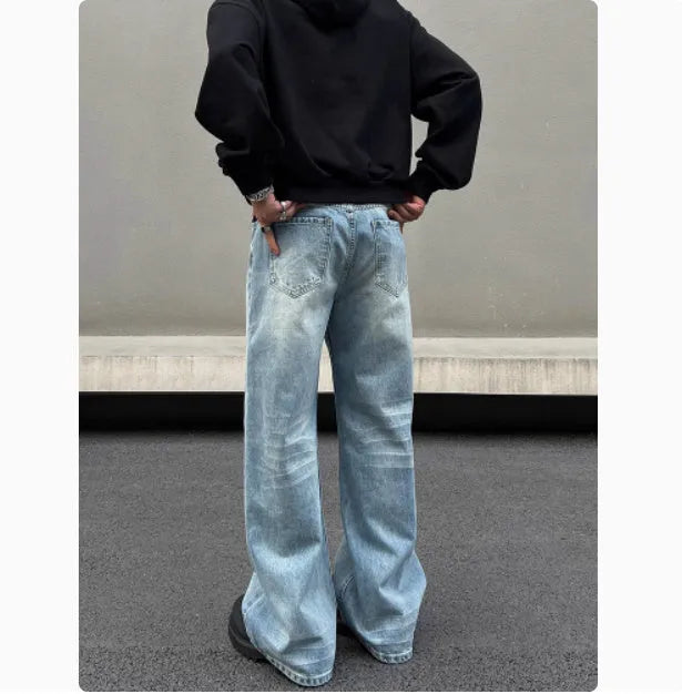 Men's blue retro whisker washed straight leg jeans with medium-high waist and flared leg