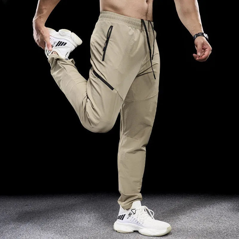 Men's waterproof quick-dry nylon workout trousers in multiple colours for sports and leisure