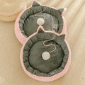 Suede cat litter mat with cat ears design, 36cm diameter, in pink and white colour