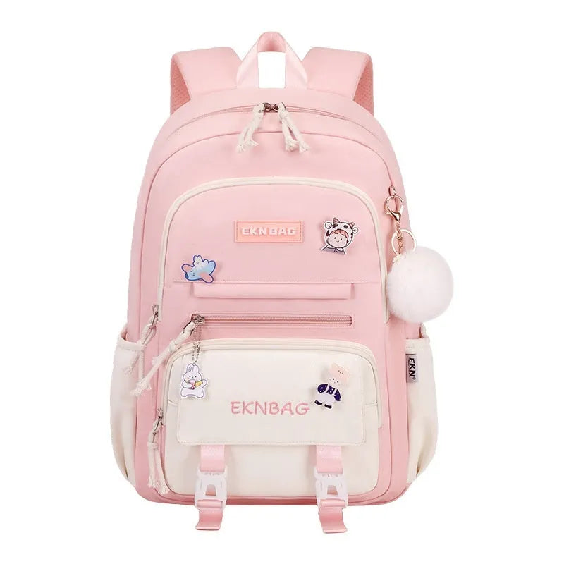 Pink waterproof school backpack for girls with curved shoulder straps, shown with matching pencil case.