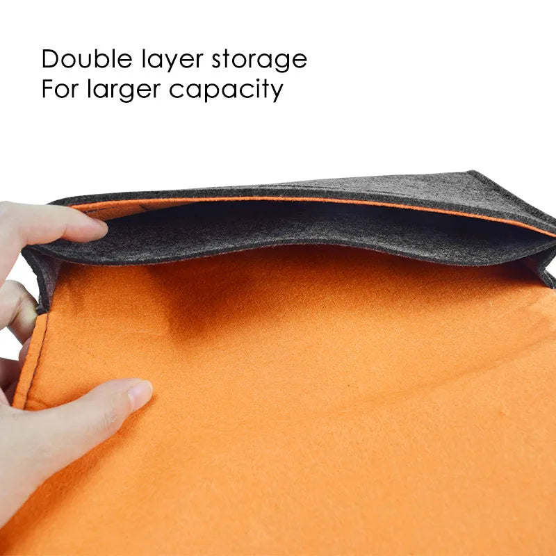 Black Nintendo Switch felt pouch bag showing game card slots and double layer storage compartments