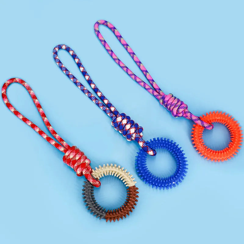 Blue, red, and rose red braided rope puppy knot dog toy showing knotted design