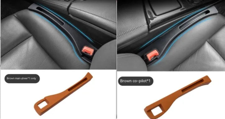 Black plastic car seat gap storage box with handle positioned between vehicle seats