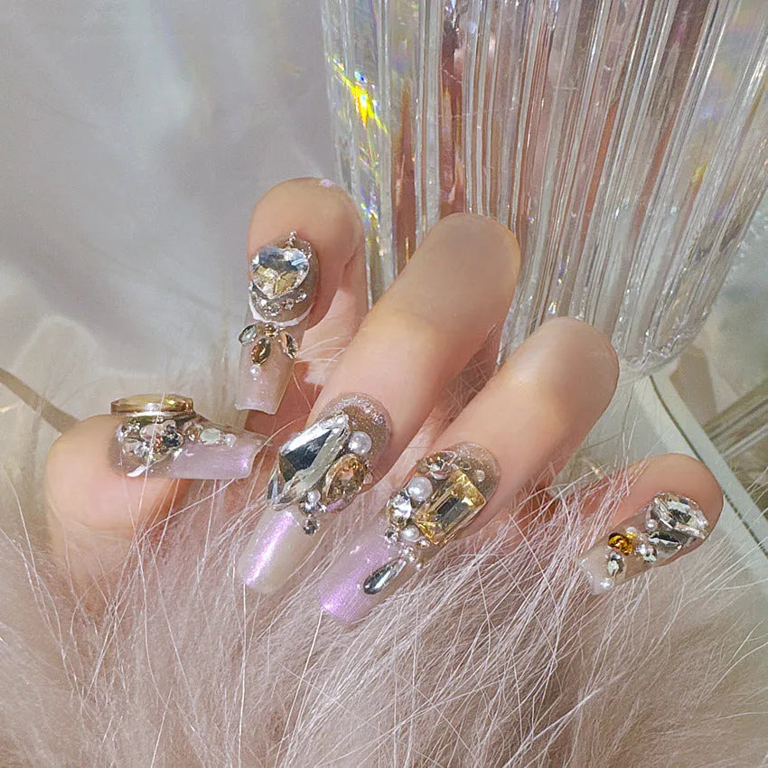Rhinestone-decorated false nail patches with application kit options on card packaging