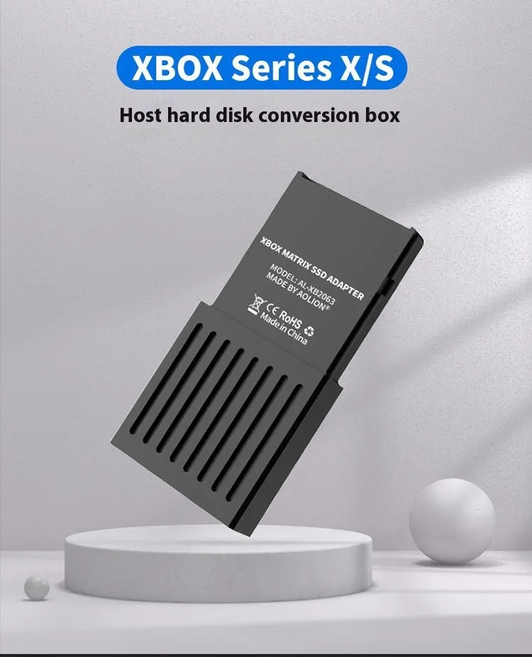 Aluminium Xbox Series X/S hard disk switching box for M.2 SSD expansion, with screwdriver and manual.