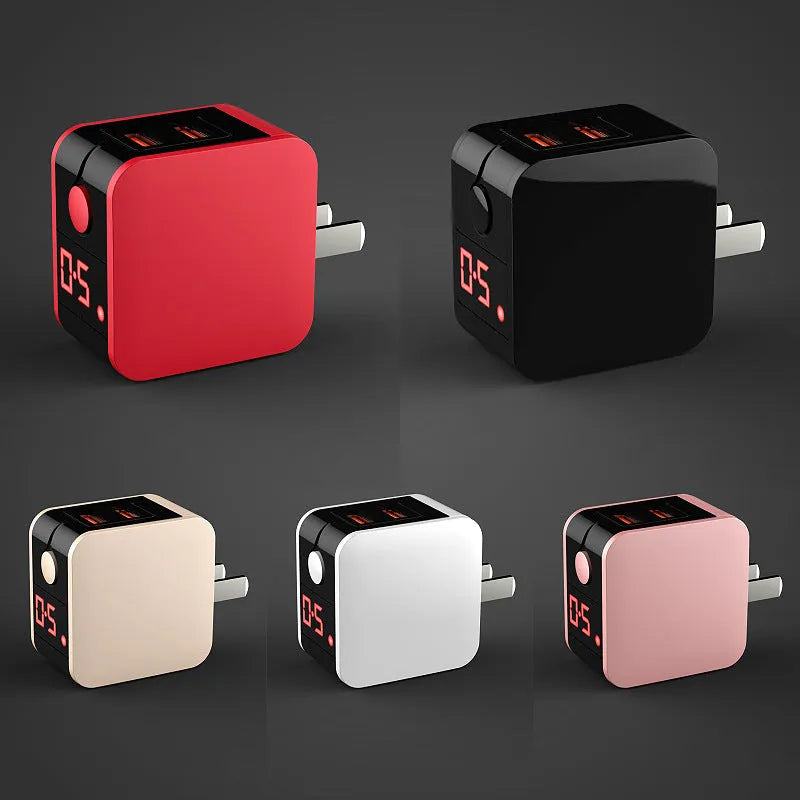 Black dual USB fast charger with digital display showing 5V output and UK plug