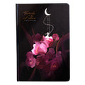 A5 notebook with luminous cover open to show pages filled with colour illustrations
