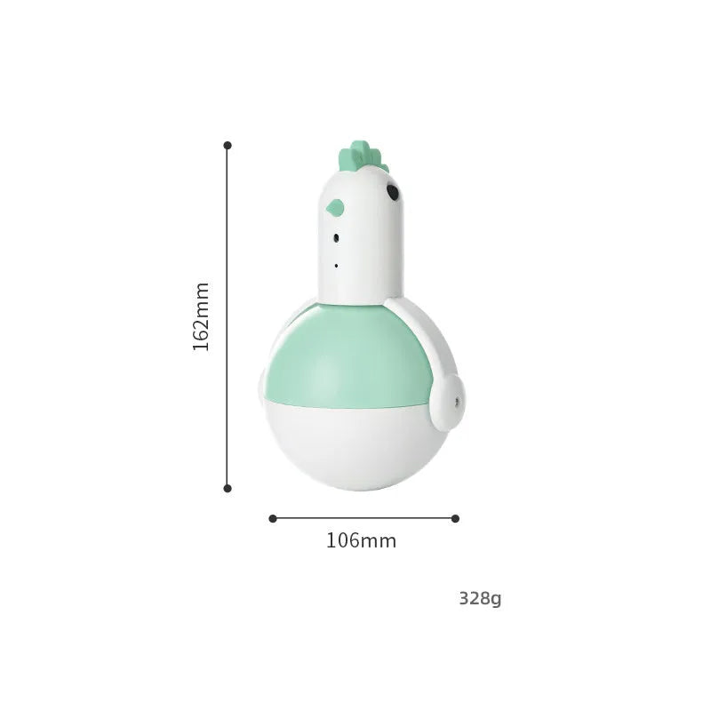 Green electric cat toy chicken with laser light feature on flat surface