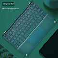Square hat touch Bluetooth wireless charging keyboard in one of eight colour options on a desk.