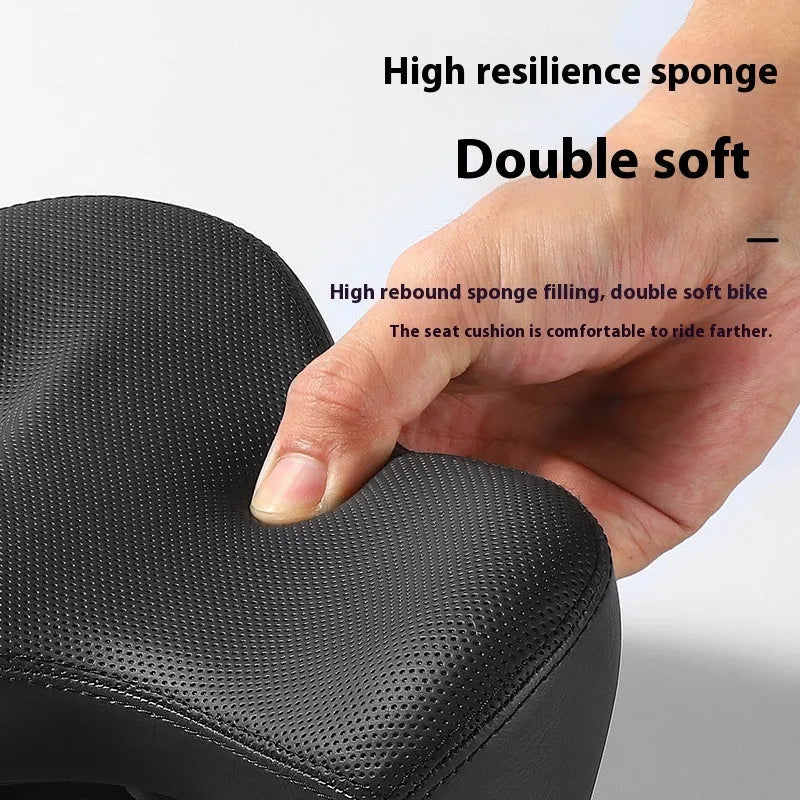 Black bicycle seat cushion with leather cover and foam padding for shock absorption