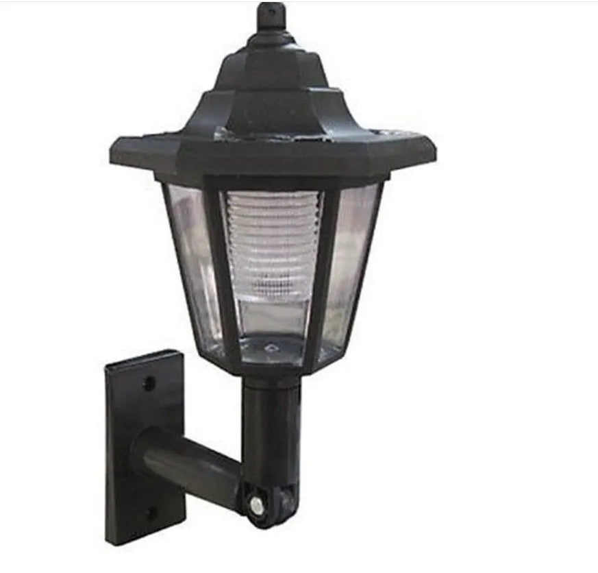 Black hexagonal solar wall lamp with solar panel, measuring 13x15x22cm