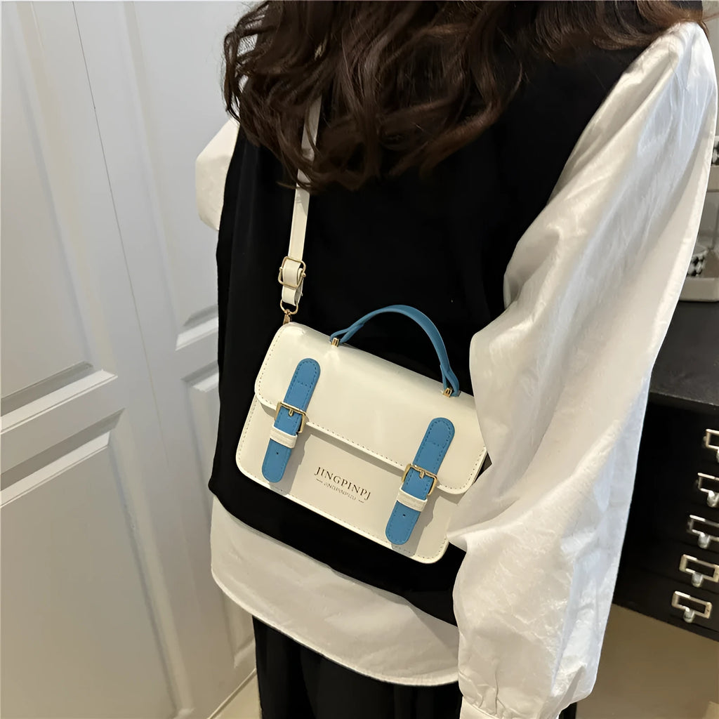 Women's PU square shoulder bag in black with sandwich pocket and strap