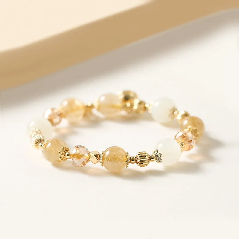 Lucky Fortune gold coloured Korean style bracelet with a single rutilated quartz crystal bead.