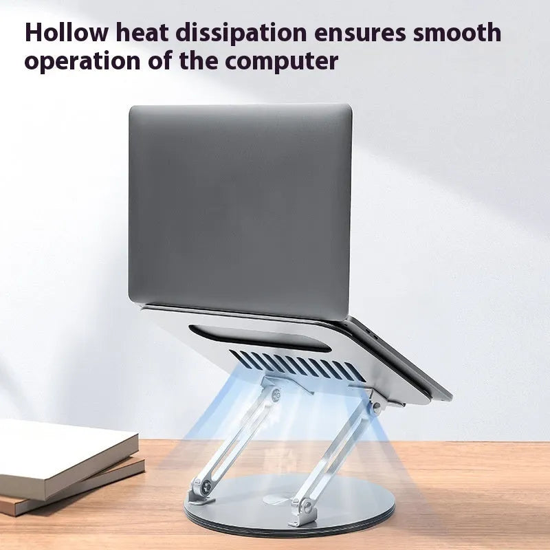 Silver aluminium alloy laptop stand with rotatable top and foldable design on desk