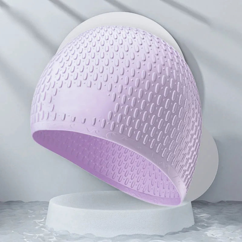 Solid colour silicone swimming cap for adults in one of nine available colours.