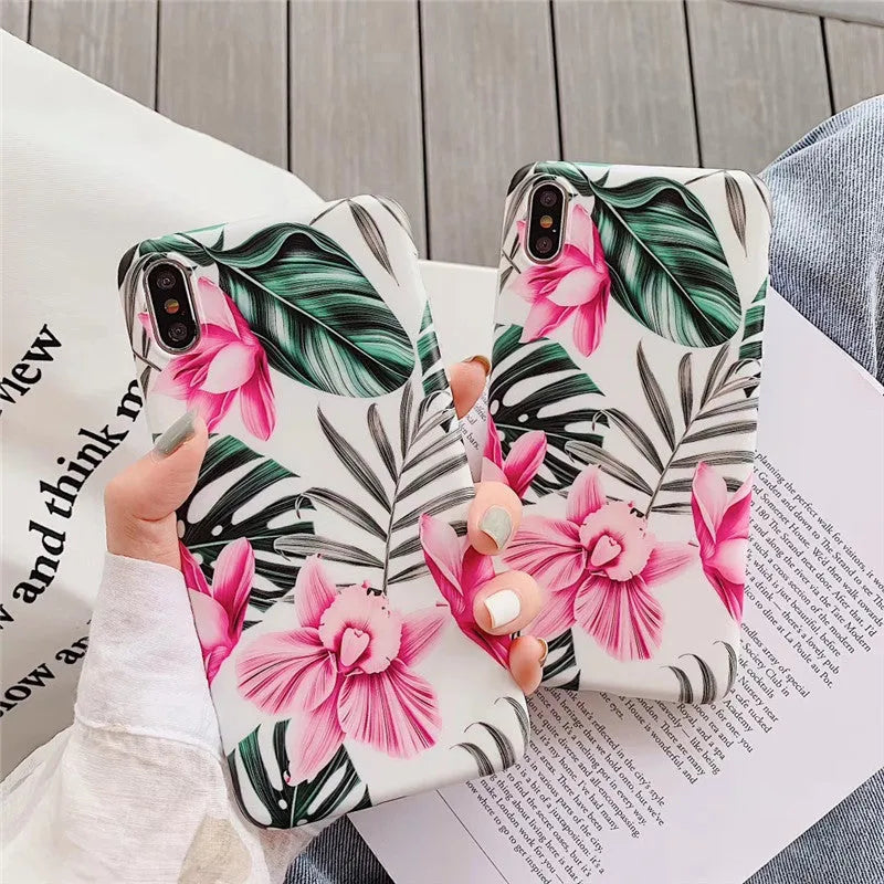 Pink floral design TPU phone case for iPhone on a table